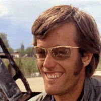 Man With Sunglasses Smiling in Car