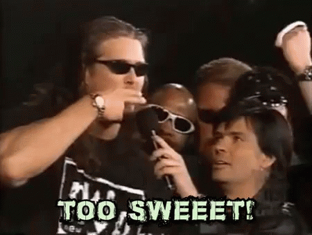 Man with Sunglasses Talking Into Microphone