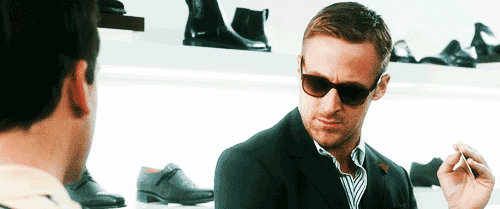 Man With Sunglasses Talking to Another Man