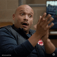Man With Surprised Look Clapping GIF