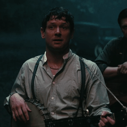 Man With Suspenders And Ring Smiling GIF