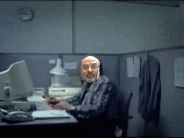 Man With Swapped Head Throw Computer GIF