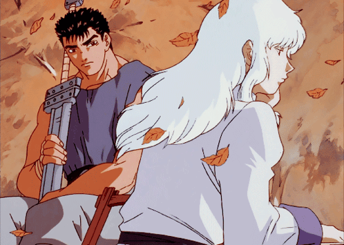 Man With Sword and Woman With White Hair Sitting Together