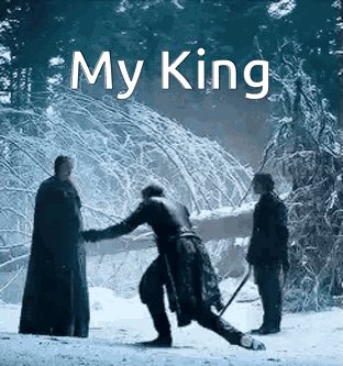 Man With Sword In Snow, Another Man Watches GIF