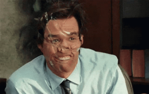 Man With Tape on Face Smiling at Camera