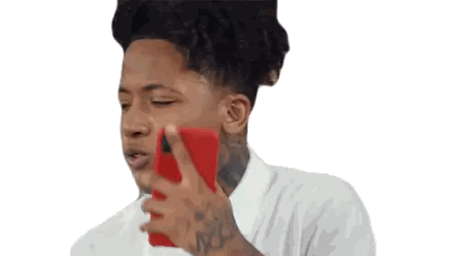 Man with Tattoo Holding Red Cell Phone