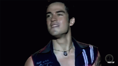 Man With Tattoo on Face Dancing With RBD GIF