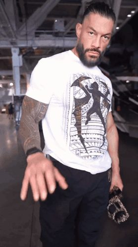 Man With Tattoo Saying A GIF