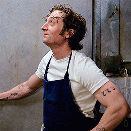 Man with Tattoo Saying ZZ