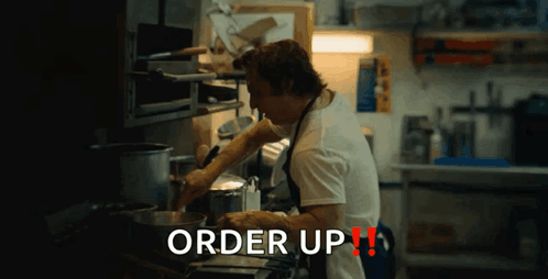 Man with Tattoo 'zz' Wearing Apron