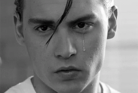 Man With Tear Running Down Face