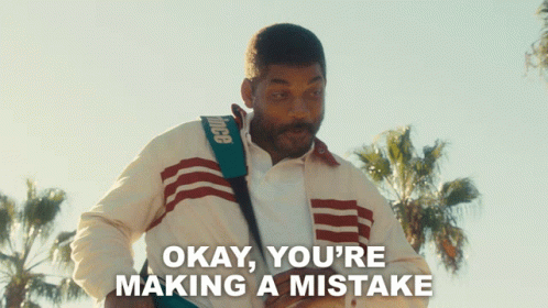 Man With Tennis Racquet Says Okay You're Making a Mistake