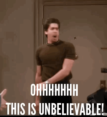 Man With This Is Unbelievable On Face Standing Before Door GIF