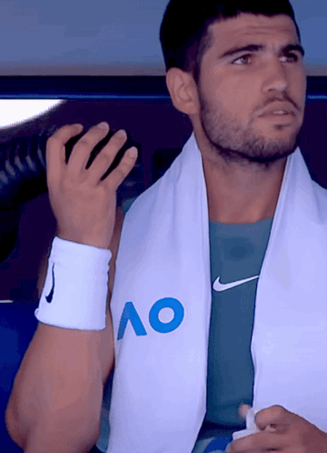 Man With Towel And AO Shirt GIF