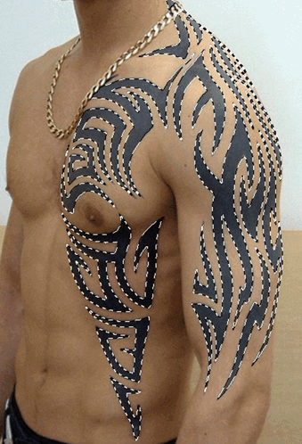 Man With Tribal Chest Tattoo GIF