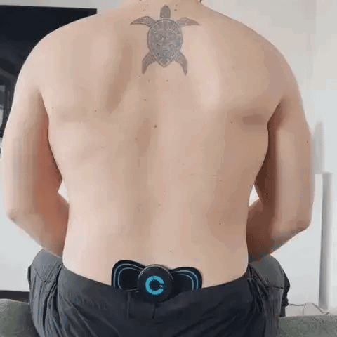 Man With Turtle Tattoo Sitting on Couch