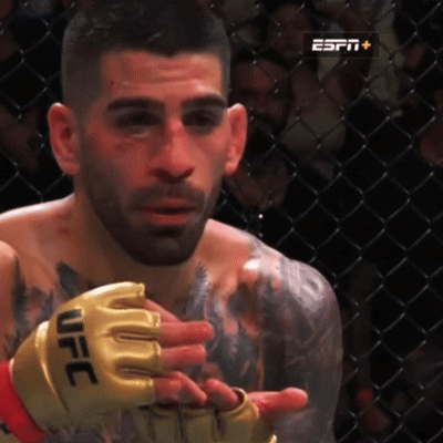 Man With UFC Gloves In Boxing Ring GIF