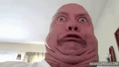 Man With Ugly Face Making Funny Face at Camera