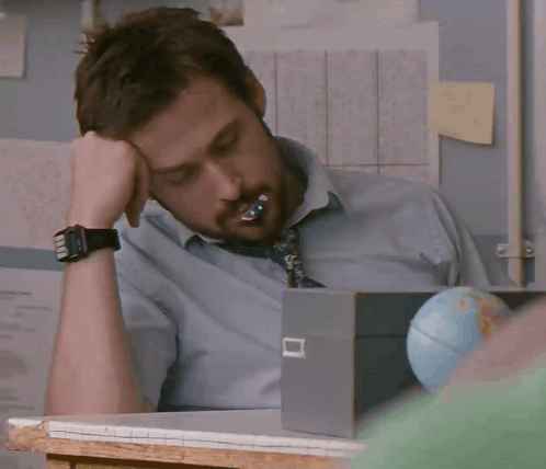 Man With Watch Hand On Face GIF
