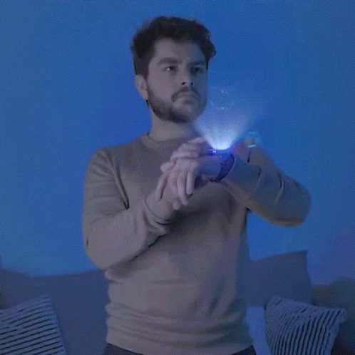 Man With Watch Looking At World Map GIF