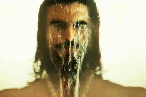 Man With Water Coming From Nose and Mouth