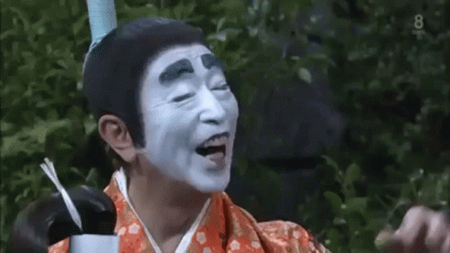 Man with White Face Paint in Kimono