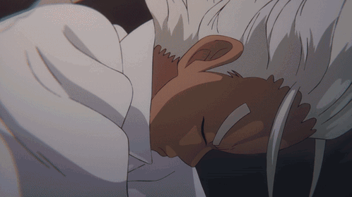 Man With White Hair Laying Down