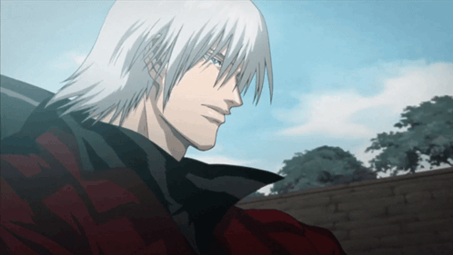 Man With White Hair Reading Foreign Language Book GIF