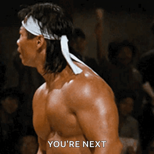 Man with White Headband Says Youre Next