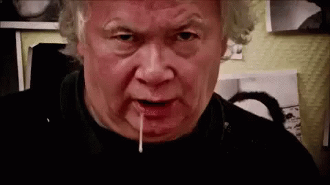 Man With White Liquid Mouth and Nose