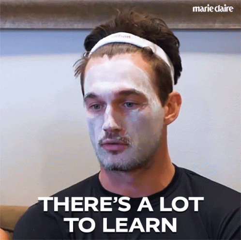 Man With White Mask Saying There's a Lot to Learn