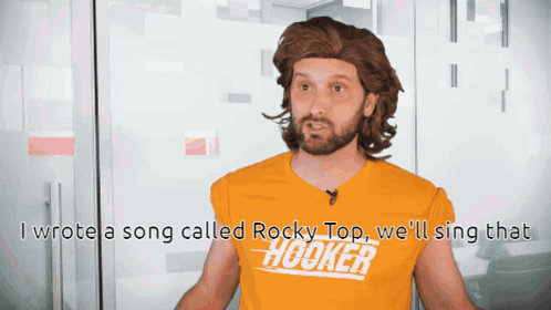 Man With Wig and Hooker Shirt