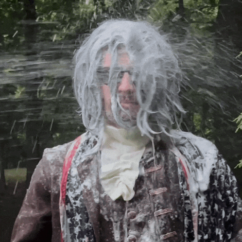 Man With Wig And Sunglasses Covered In Soap GIF