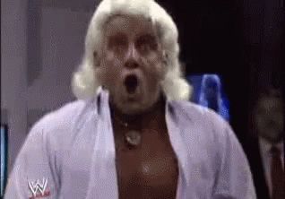 Man with Wig Wearing White W Shirt