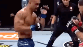 Man Without Shirt Fighting in Boxing Ring