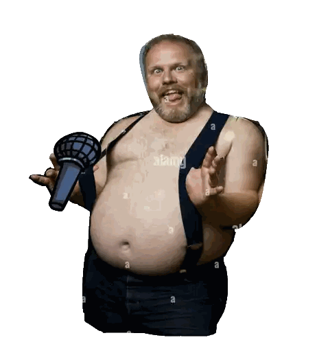 Man Without Shirt Holding Microphone