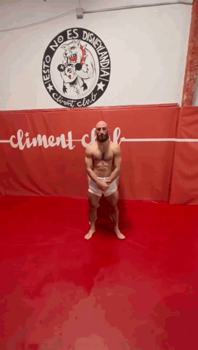 Man Without Shirt in Front of Clement Club