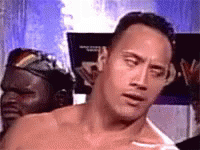 Man Without Shirt in Front of The Rock Sign