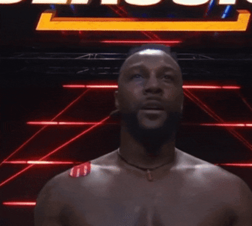 Man Without Shirt In Front Of UFC Sign GIF