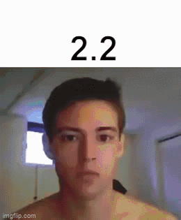 Man Without Shirt Looking at Camera With 2.2