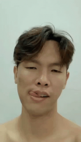 Man Without Shirt Making Funny Face With Tongue Out GIF