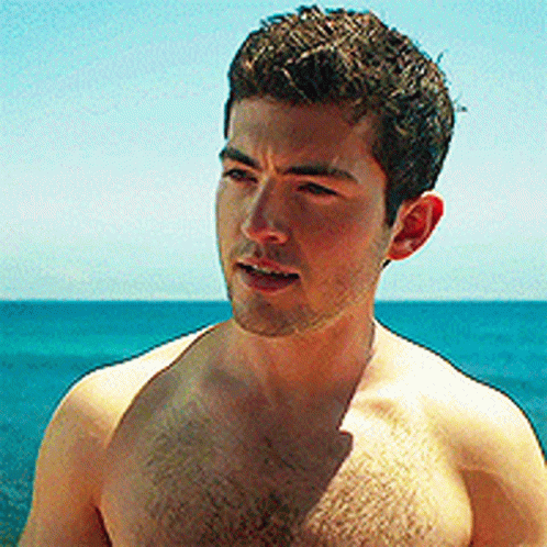 Man Without Shirt Standing Ocean