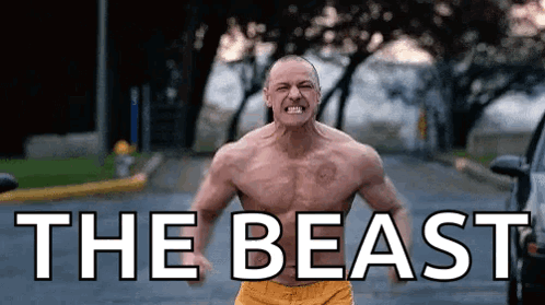 Man Without Shirt Standing on Street