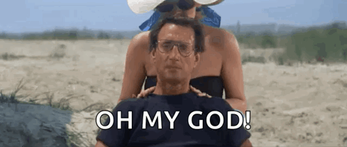 Man Woman on Beach Saying Oh My God