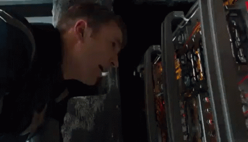 Man Working on Machine That Runs on Electricity