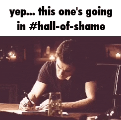 Man Writing on Paper