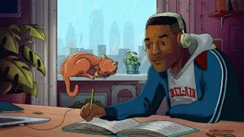 Man Writing With Headphones Cat Sleeping on Window Sill