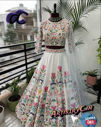 Mannequin in White Dress With Colorful Flowers