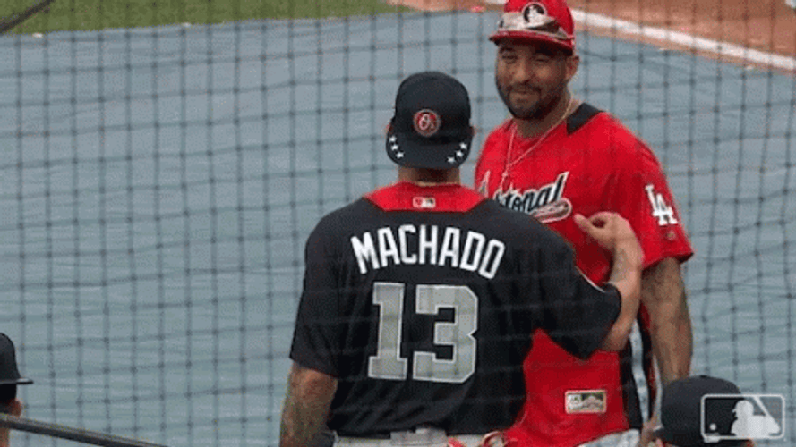 Manny Machado Hugging An Opponent GIF