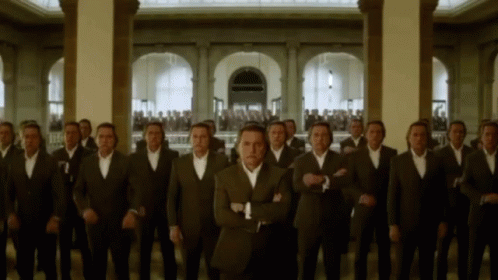 Many Men Crossing Arms Together GIF